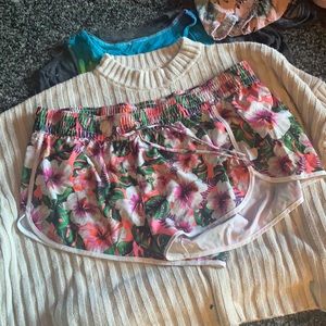 Women’s pink floral swim shorts, size L